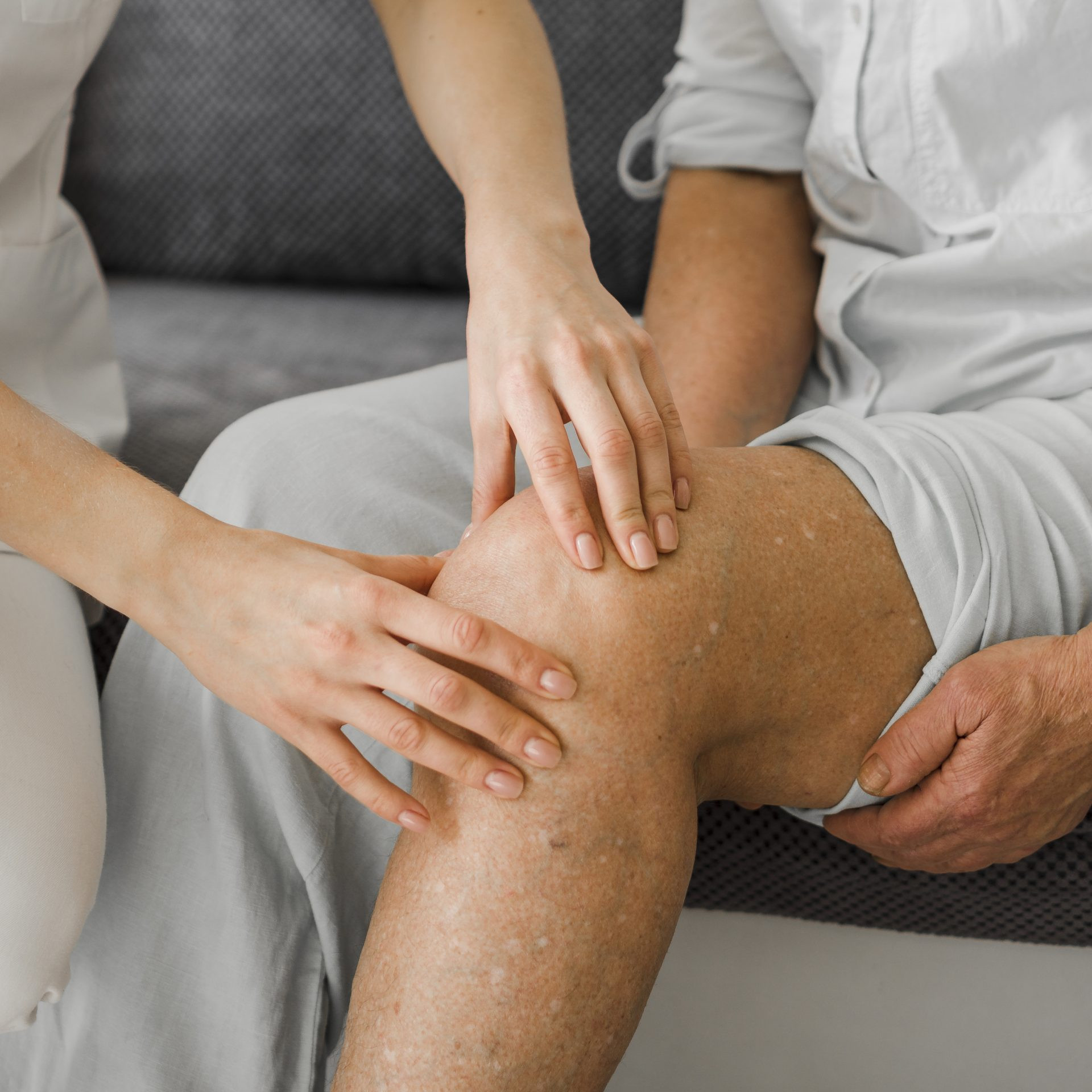 person having their knee inspected for osteoarthritis